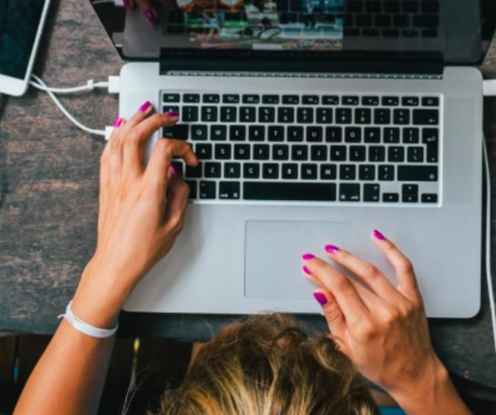 a person working on their laptop computer